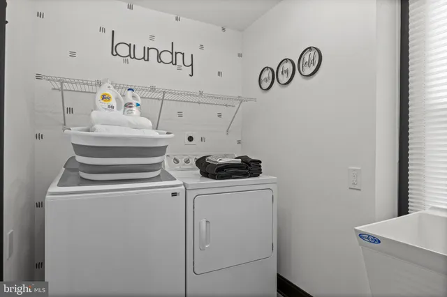 a bathroom with a toilet a sink and bathtub