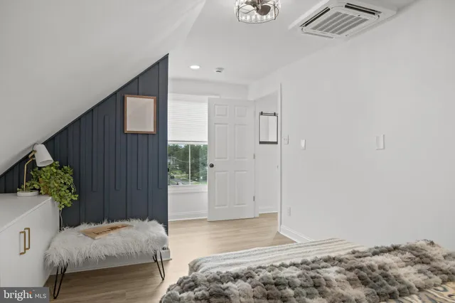 a white bath tub sitting in a bathroom