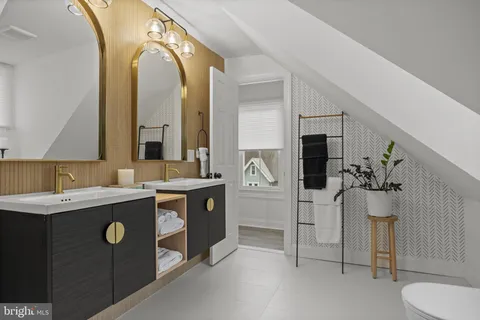 a balcony with furniture and flowers