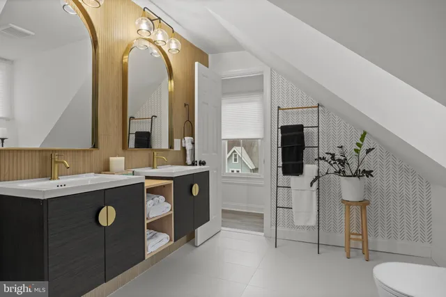 a balcony with furniture and flowers