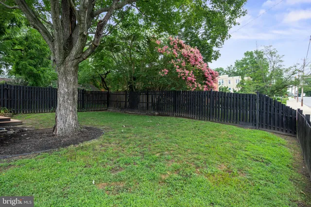 a view of a deck with furniture and wooden floor
