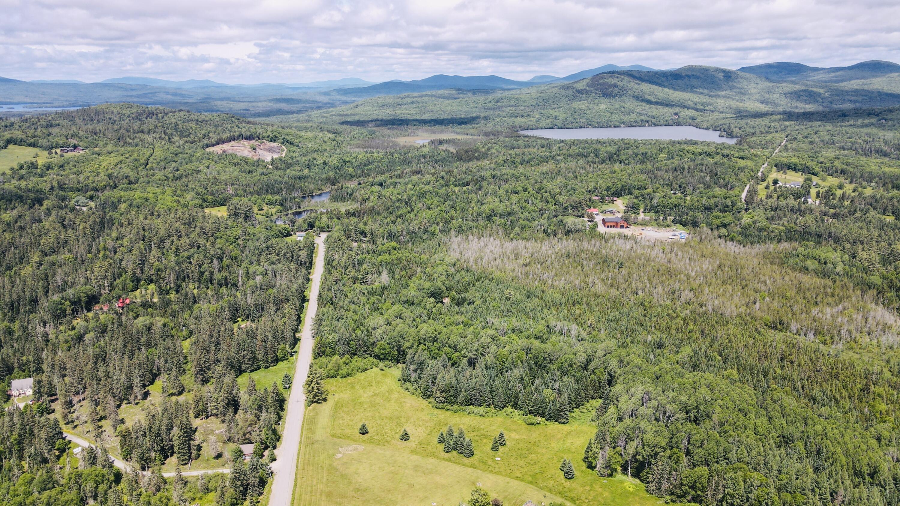 574 Mingo Loop Road Rangeley, ME 04970 - Photo 62 of 65 dji_fly_20250618_114338_706_175026151669