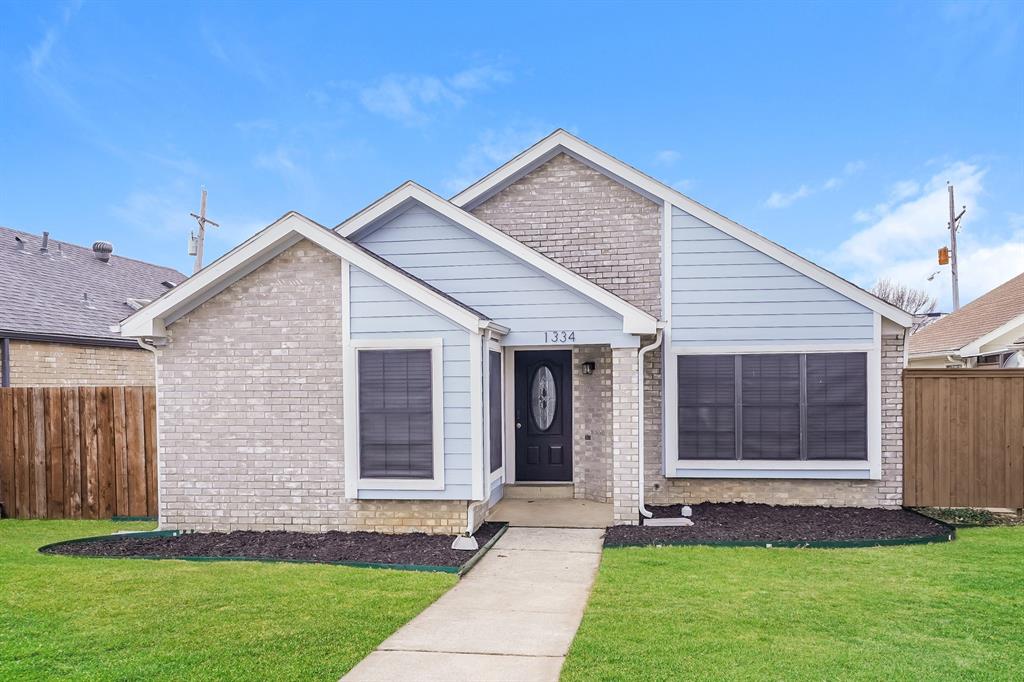 a front view of house with yard