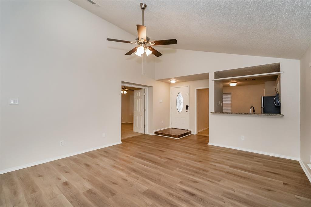 1334 Cedar Ridge Drive Lewisville, TX 75067 - Photo 15 of 16 a view of empty room with wooden floor