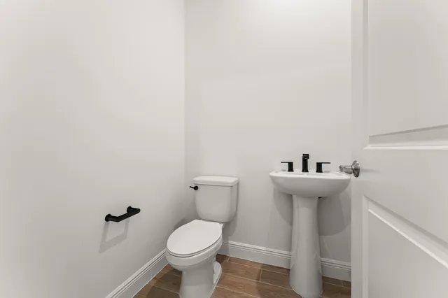 a bathroom with a sink and toilet