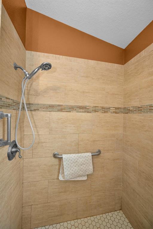 9630 Green Needle Drive New Port Richey, FL 34655 - Photo 14 of 23 a bathroom with a shower