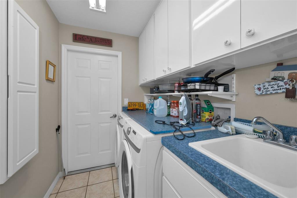 9630 Green Needle Drive New Port Richey, FL 34655 - Photo 20 of 23 a view of a kitchen with appliances and cabinets