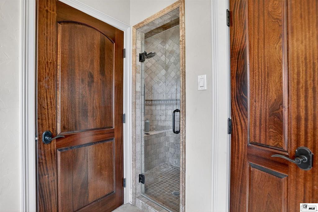 114 Apache Trail Delhi, LA 71232 - Photo 17 of 38 a bathroom with a shower