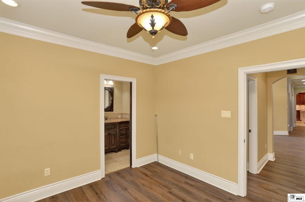 114 Apache Trail Delhi, LA 71232 - Photo 29 of 38 a view of an empty room with wooden floor