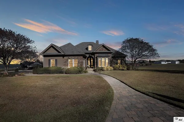 a house view with a swimming pool