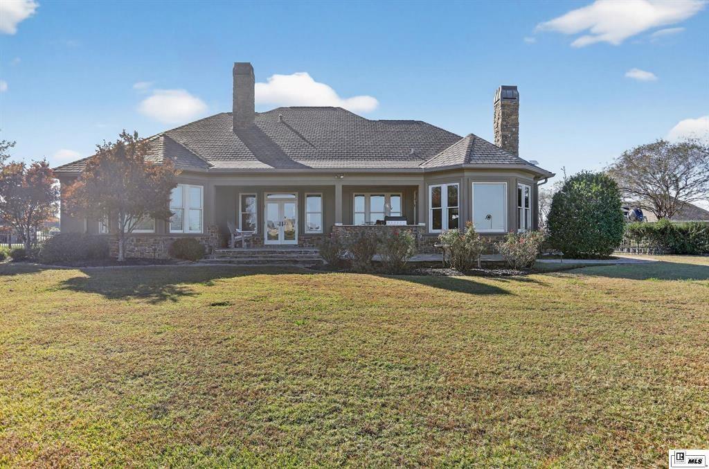 114 Apache Trail Delhi, LA 71232 - Photo 38 of 38 a house view with a swimming pool