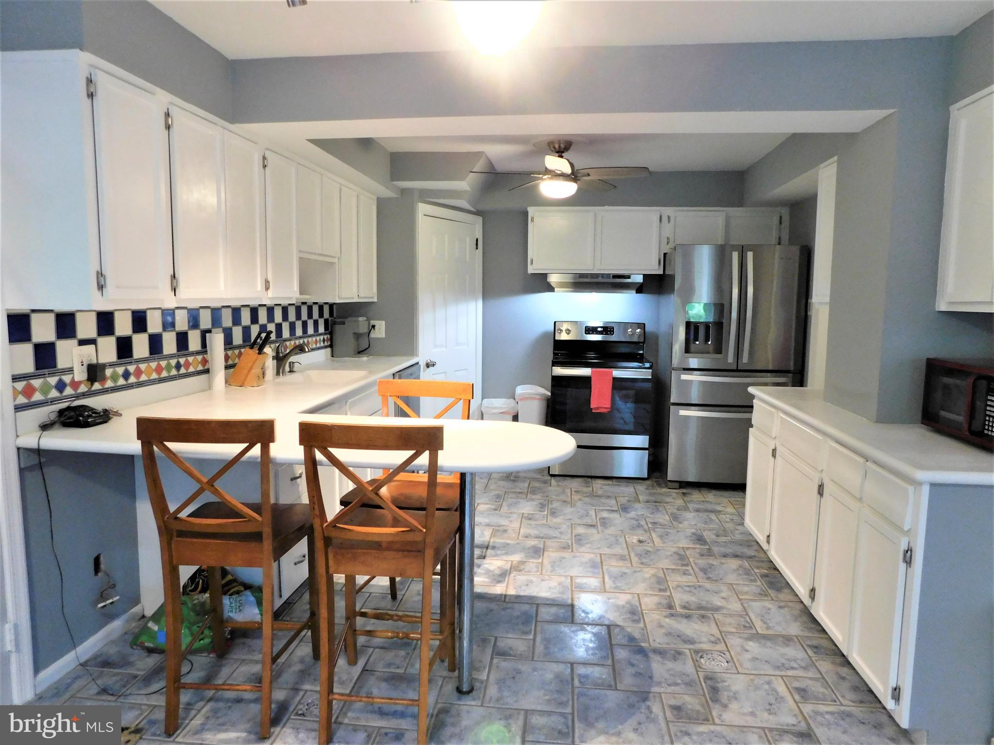 5 West Chelfield Road Glenside, PA 19038 - Photo 30 of 73 Full Kitchen w/Corian counters & custom tile flr