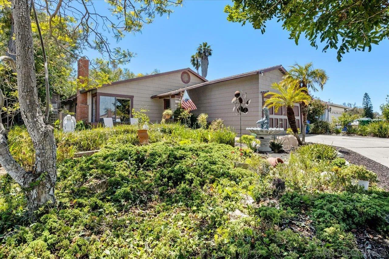 2337 Fallingleaf Road Oceanside, CA 92056 - Photo 3 of 34 a house view with a garden space