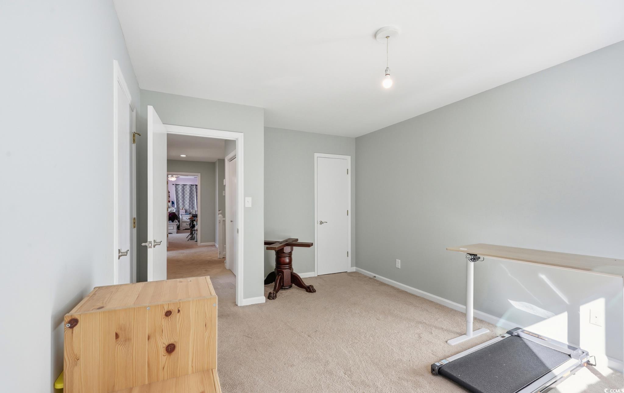 78 Wicklow Way Pawleys Island, SC 29585 - Photo 14 of 37 Unfurnished office with light carpet and baseboards