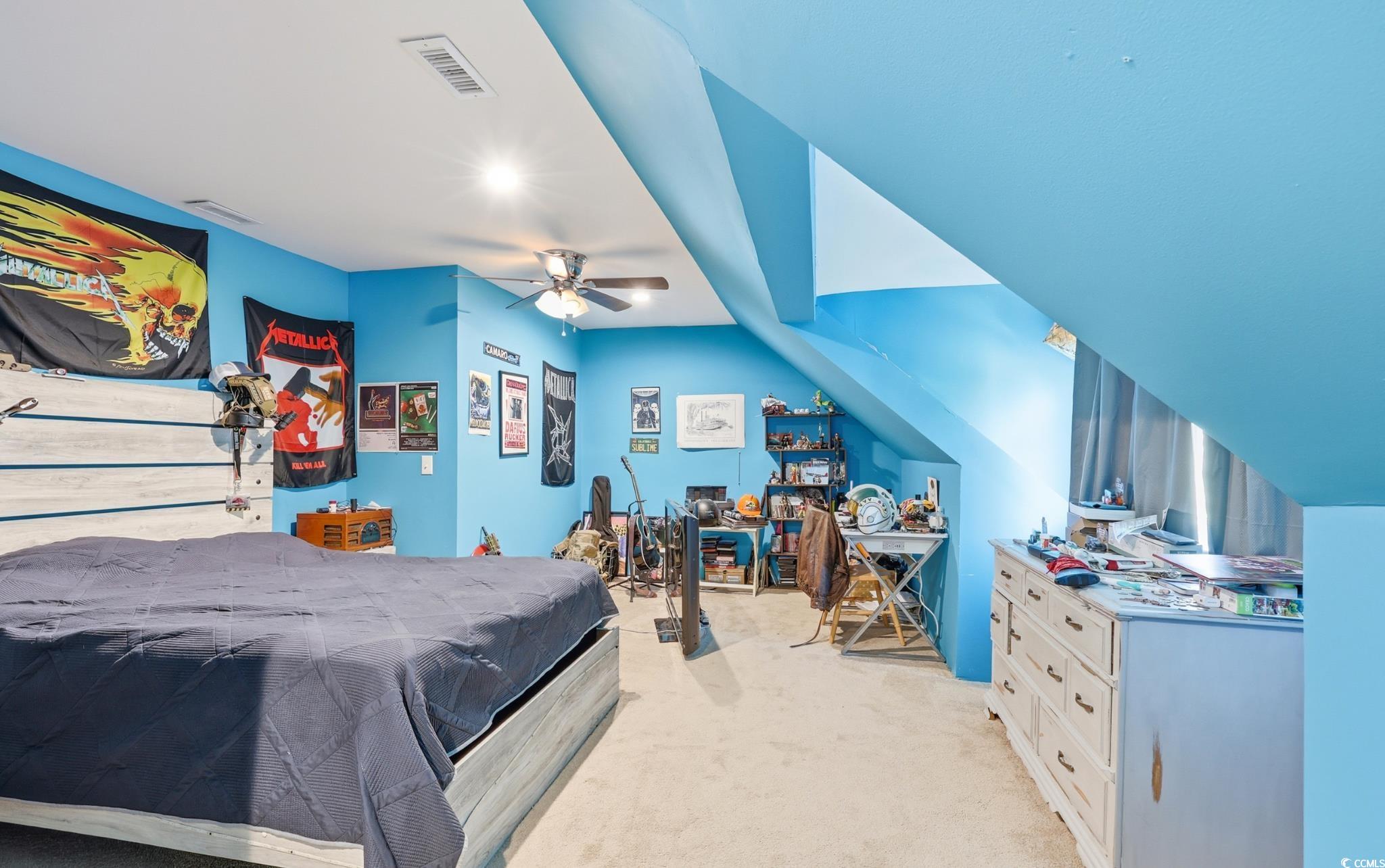 78 Wicklow Way Pawleys Island, SC 29585 - Photo 17 of 37 Bedroom featuring a ceiling fan and light carpet