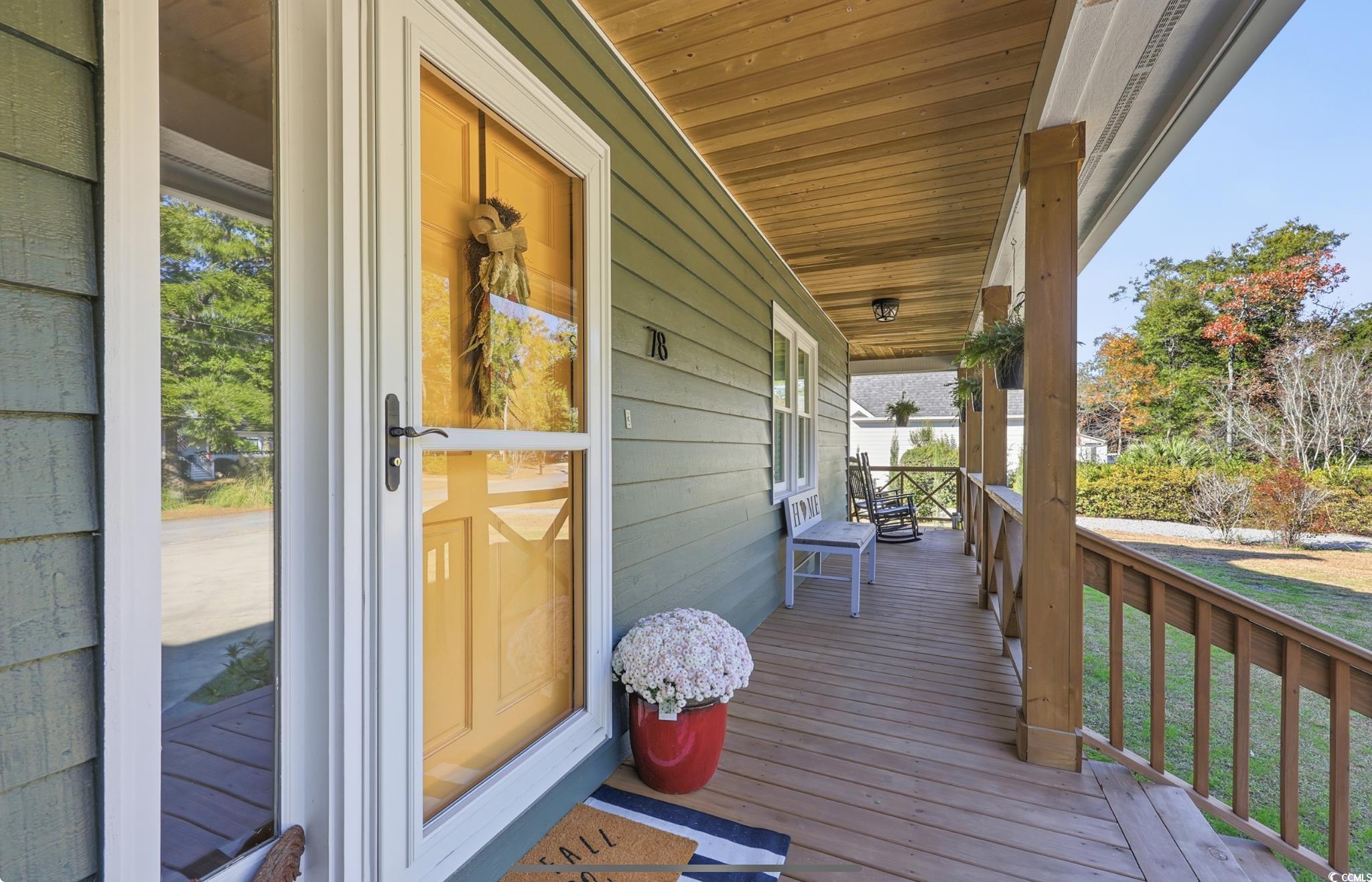 78 Wicklow Way Pawleys Island, SC 29585 - Photo 3 of 37 Porch with a yard
