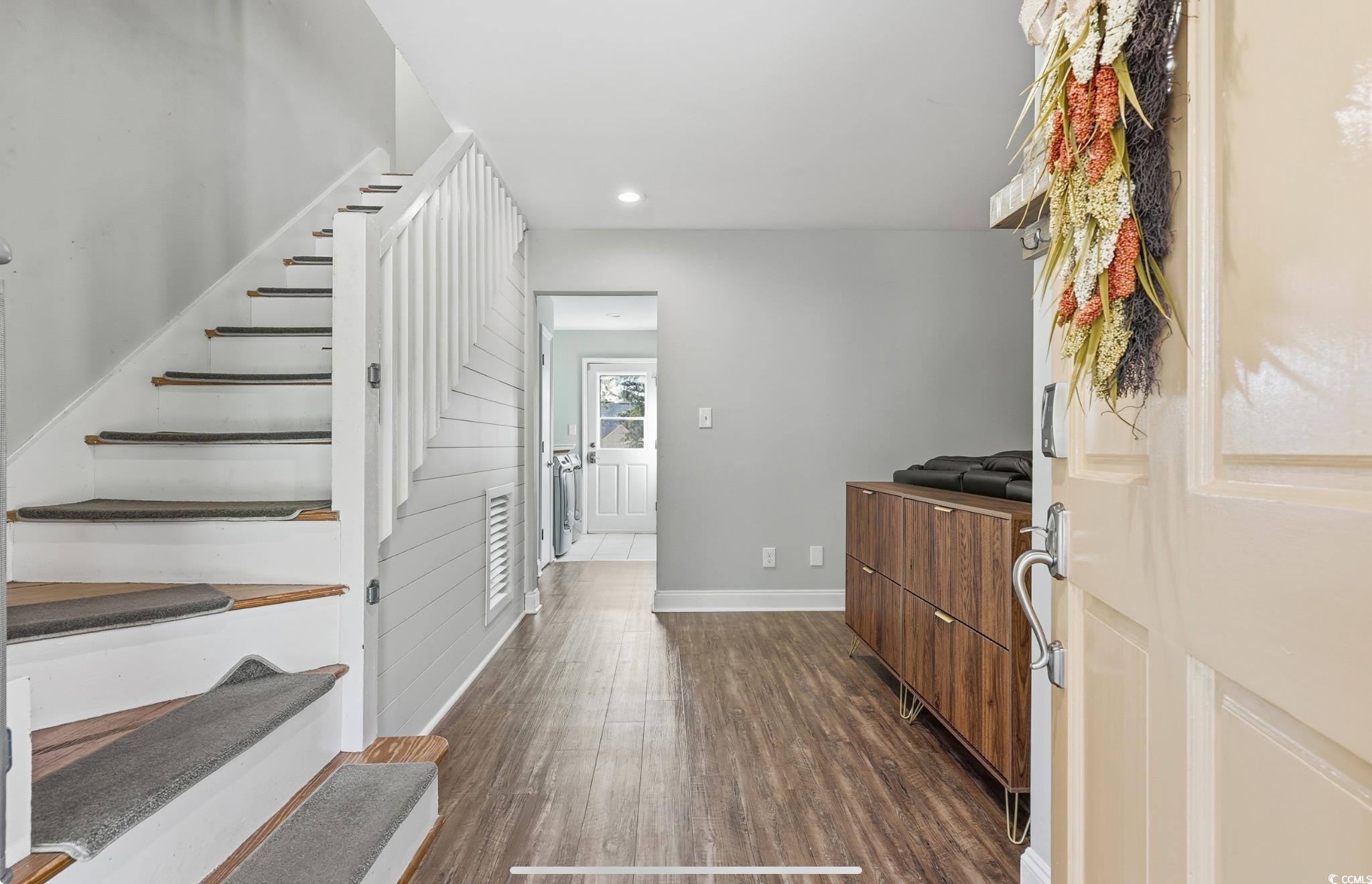 78 Wicklow Way Pawleys Island, SC 29585 - Photo 4 of 37 Entrance foyer featuring stairway, dark wood-style flooring, and recessed lighting