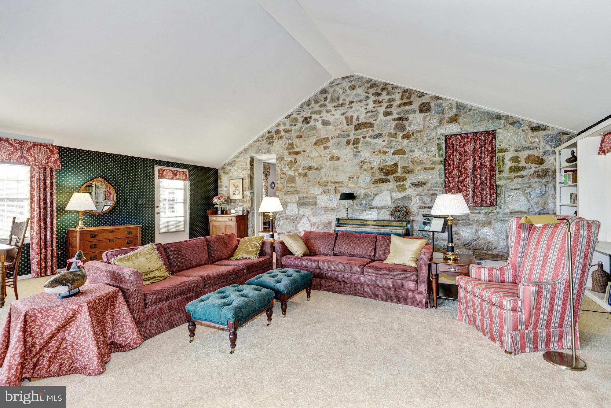 4232 Butler Road Glyndon, MD 21136 - Photo 13 of 29 Family Room | Beautiful Stone Wall