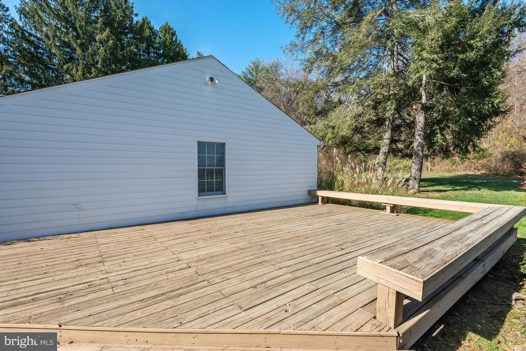 4232 Butler Road Glyndon, MD 21136 - Photo 27 of 29 Expansive Deck with Built-in Bench Seating