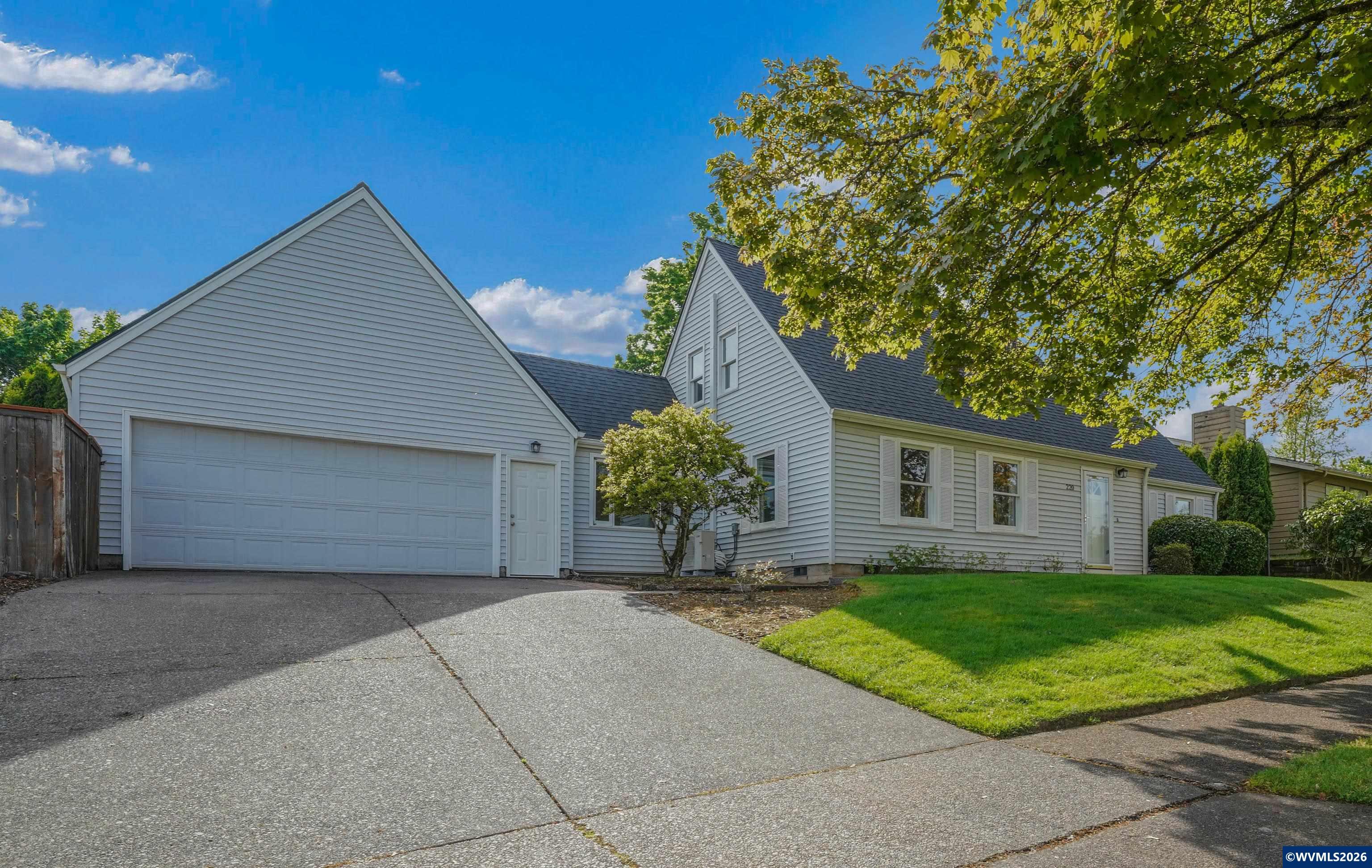 220 Northwest Downy Drive Sublimity, OR 97385 - Photo 4 of 47 a house view with a garden space