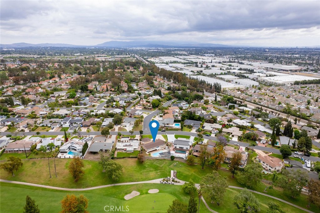 5531 Rockledge Drive Buena Park, CA 90621 - Photo 59 of 64 an aerial view of residential houses with outdoor space and swimming pool