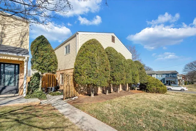 a view of a house with basketball court