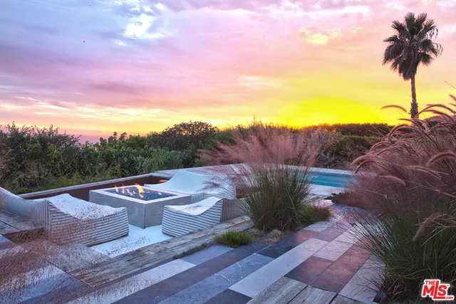 a view of a terrace with a garden