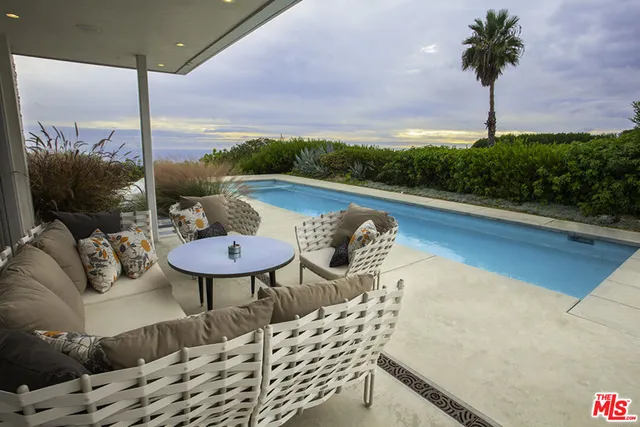 a view of a street with a houses