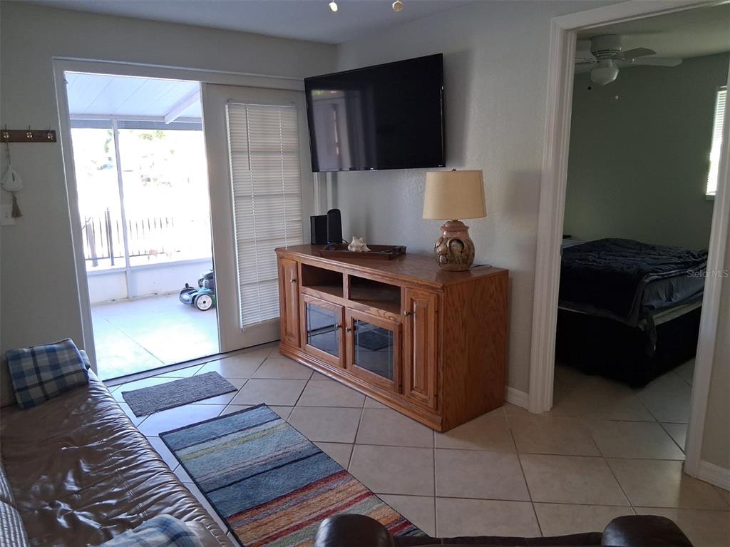 14982 Edgewater Circle Hudson, FL 34667 - Photo 11 of 22 a kitchen with stainless steel appliances granite countertop a stove and a refrigerator