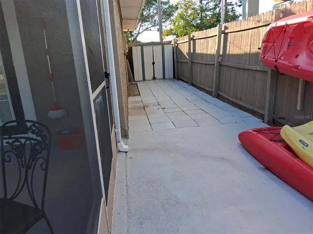 a view of backyard with green space