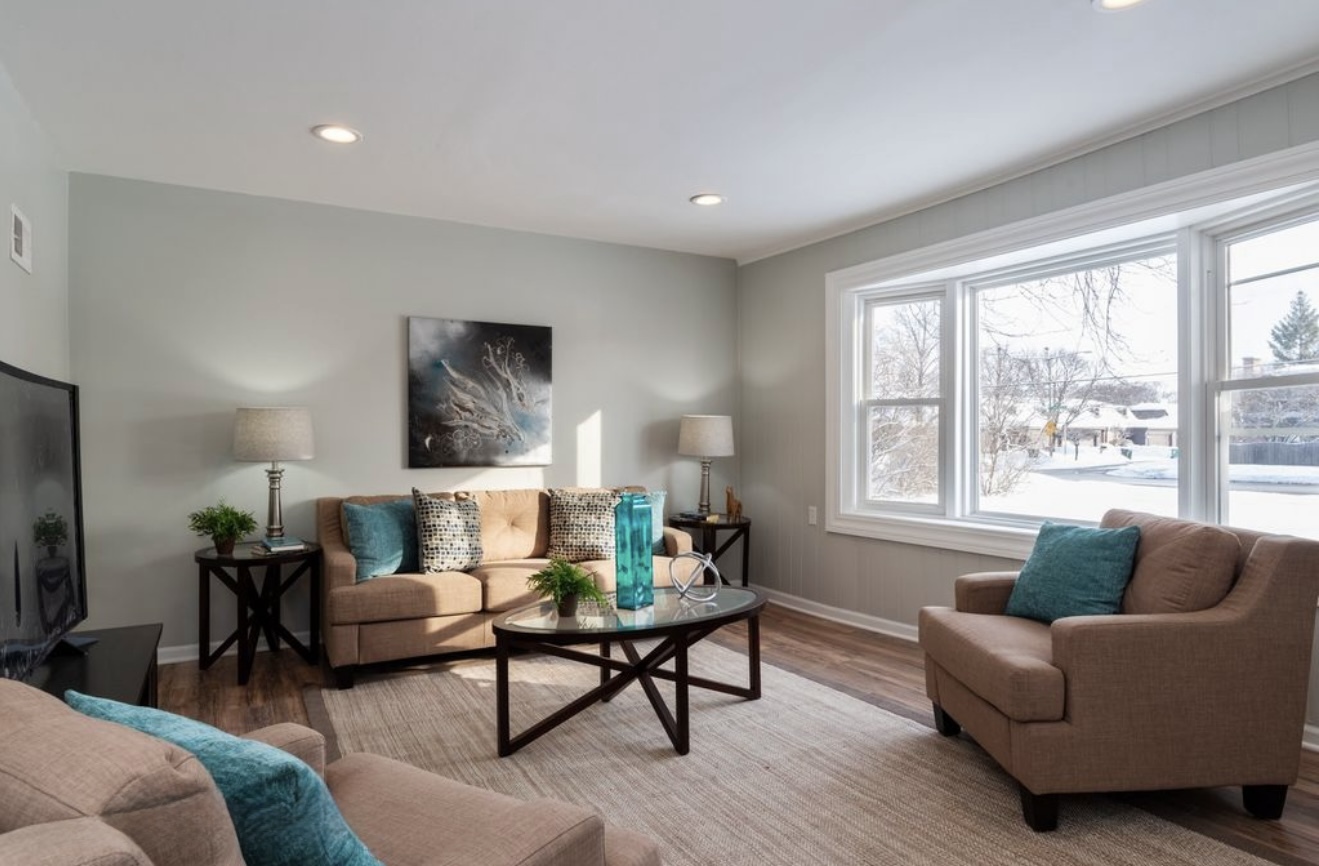 684 Pfingsten Road Northbrook, IL 60062 - Photo 13 of 33 a living room with furniture and a large window