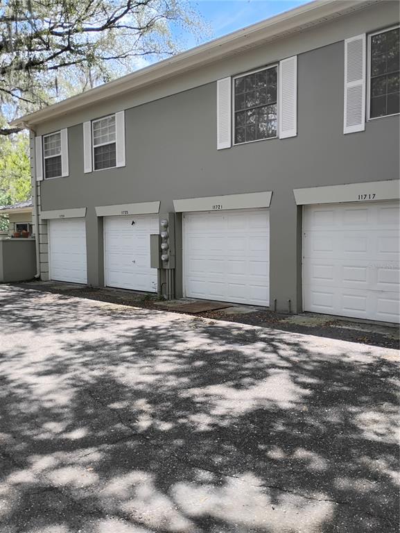 11721 Raintree Drive Tampa, FL 33617 - Photo 12 of 12 a view of a house with a street