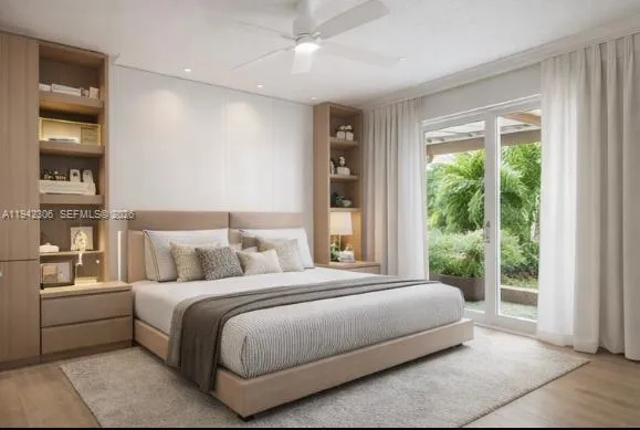 a bedroom with a large bed and a large window