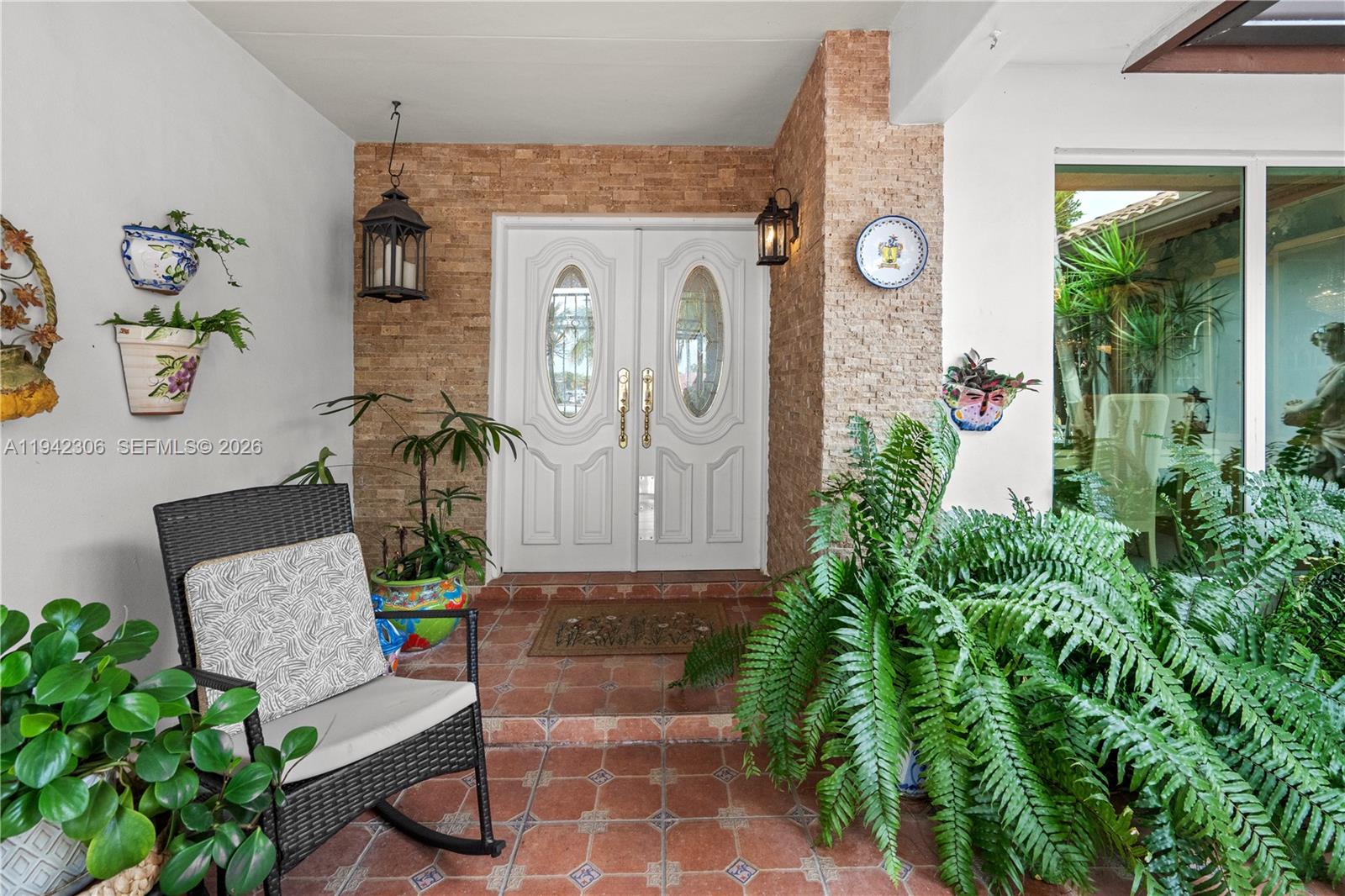 13220 Southwest 5th Street Miami, FL 33184 - Photo 5 of 35 a front view of a house with garden