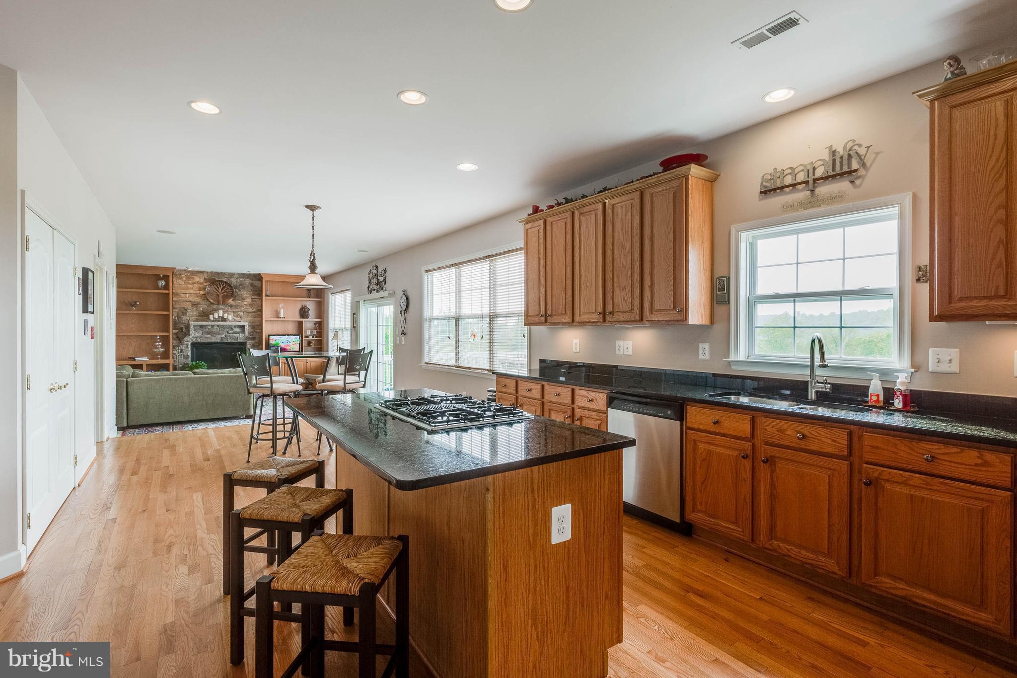 11020 Country Club Road New Market, MD 21774 - Photo 7 of 30 Kitchen flows to giant family room w/gas fireplace