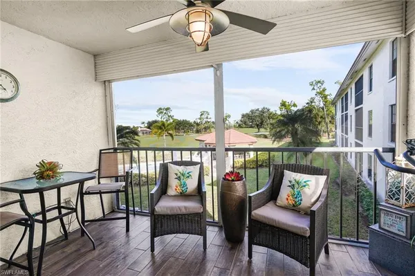 a outdoor living space with furniture and a potted plant