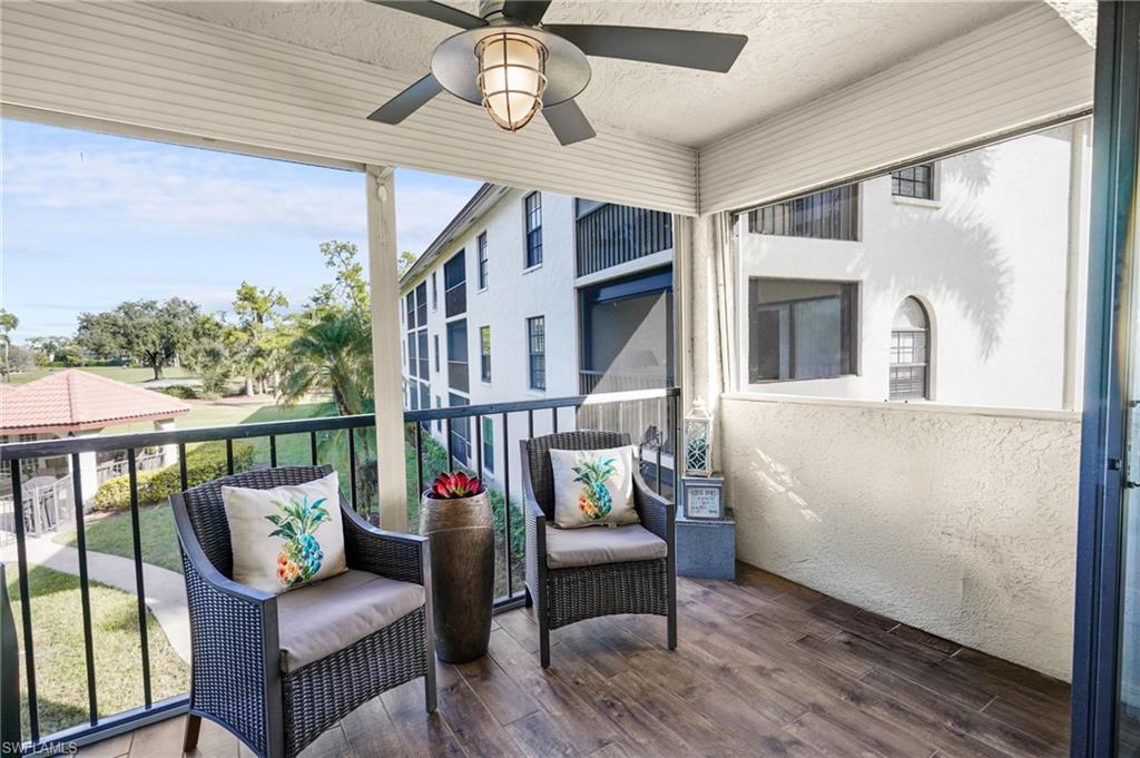601 Augusta Boulevard, Unit 10 Naples, FL 34113 - Photo 4 of 27 Balcony featuring a ceiling fan
