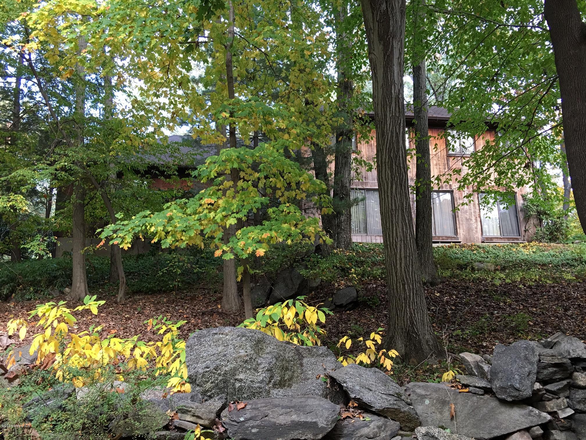 25 Bailiwick Road Greenwich, CT 06831 - Photo 1 of 7 a view of a garden with flowers