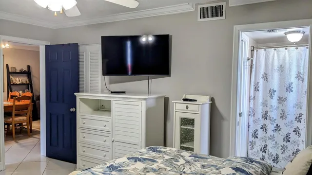 a kitchen with granite countertop a sink stove and cabinets
