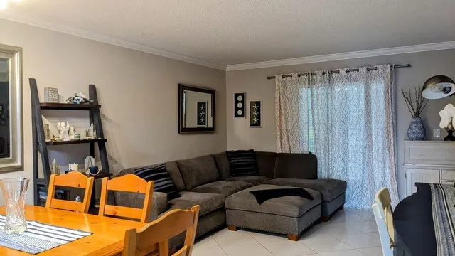 a living room with furniture and a couch
