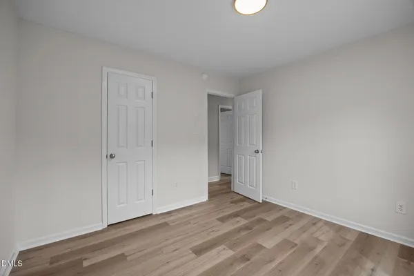 a view of a livingroom with wooden floor