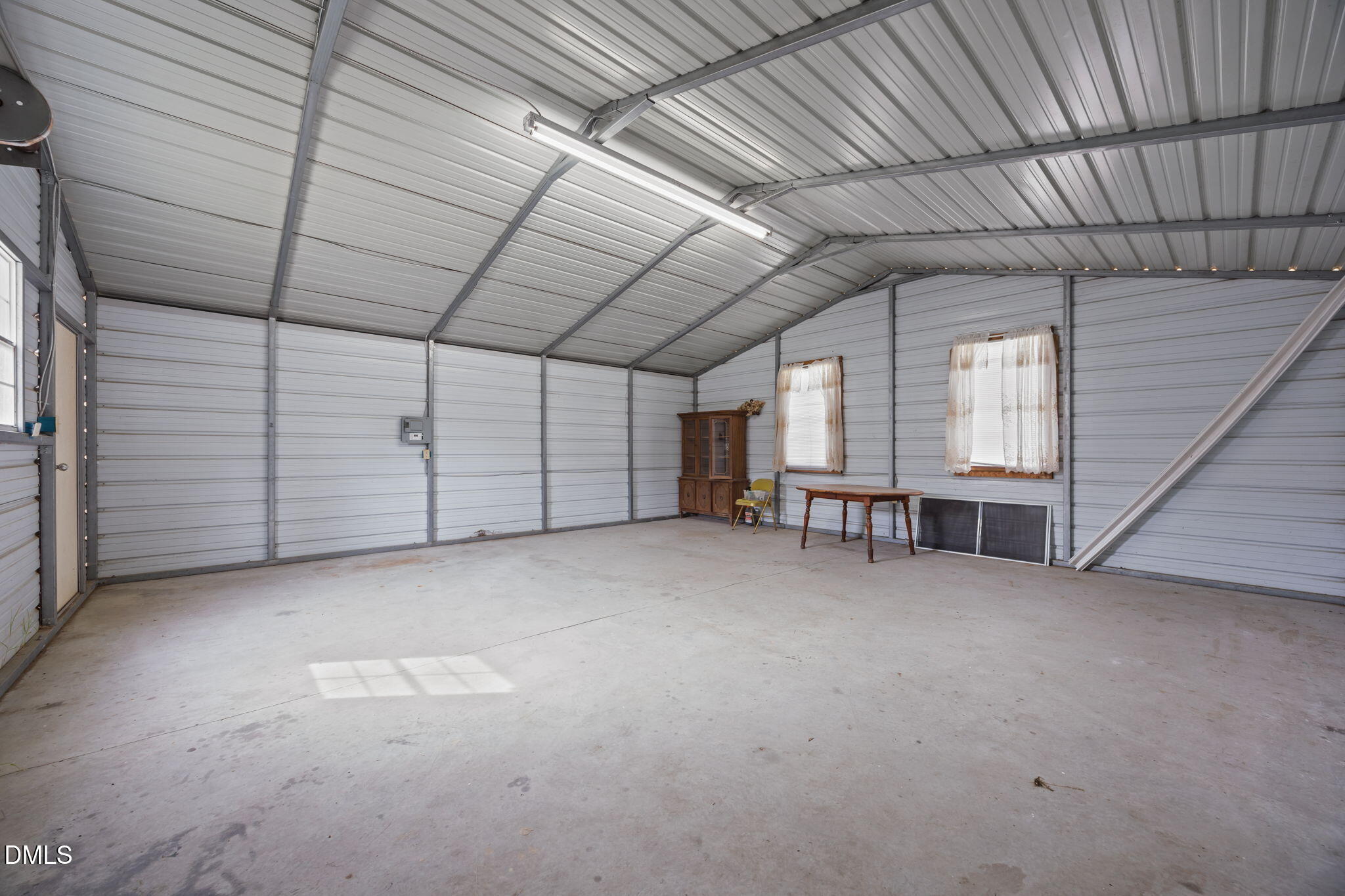 3285 Free Union Church Road Pinetown, NC 27865 - Photo 27 of 41 a view of an empty room with a windows