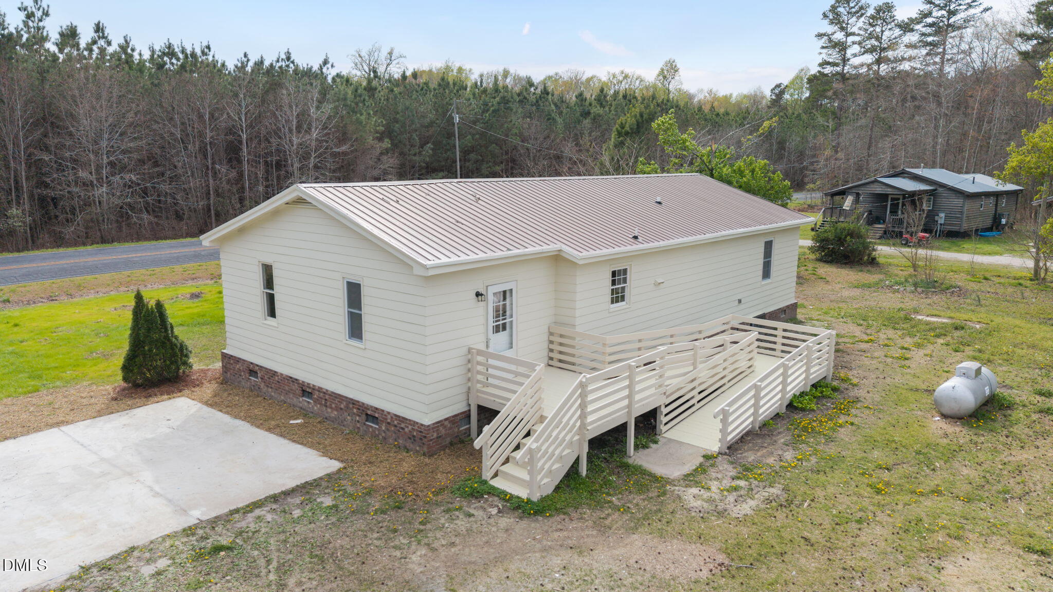 3285 Free Union Church Road Pinetown, NC 27865 - Photo 33 of 41 a view of a house with a yard balcony and a slide