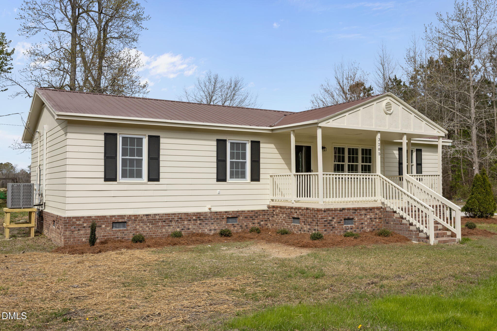 3285 Free Union Church Road Pinetown, NC 27865 - Photo 34 of 41 a front view of a house with a garden