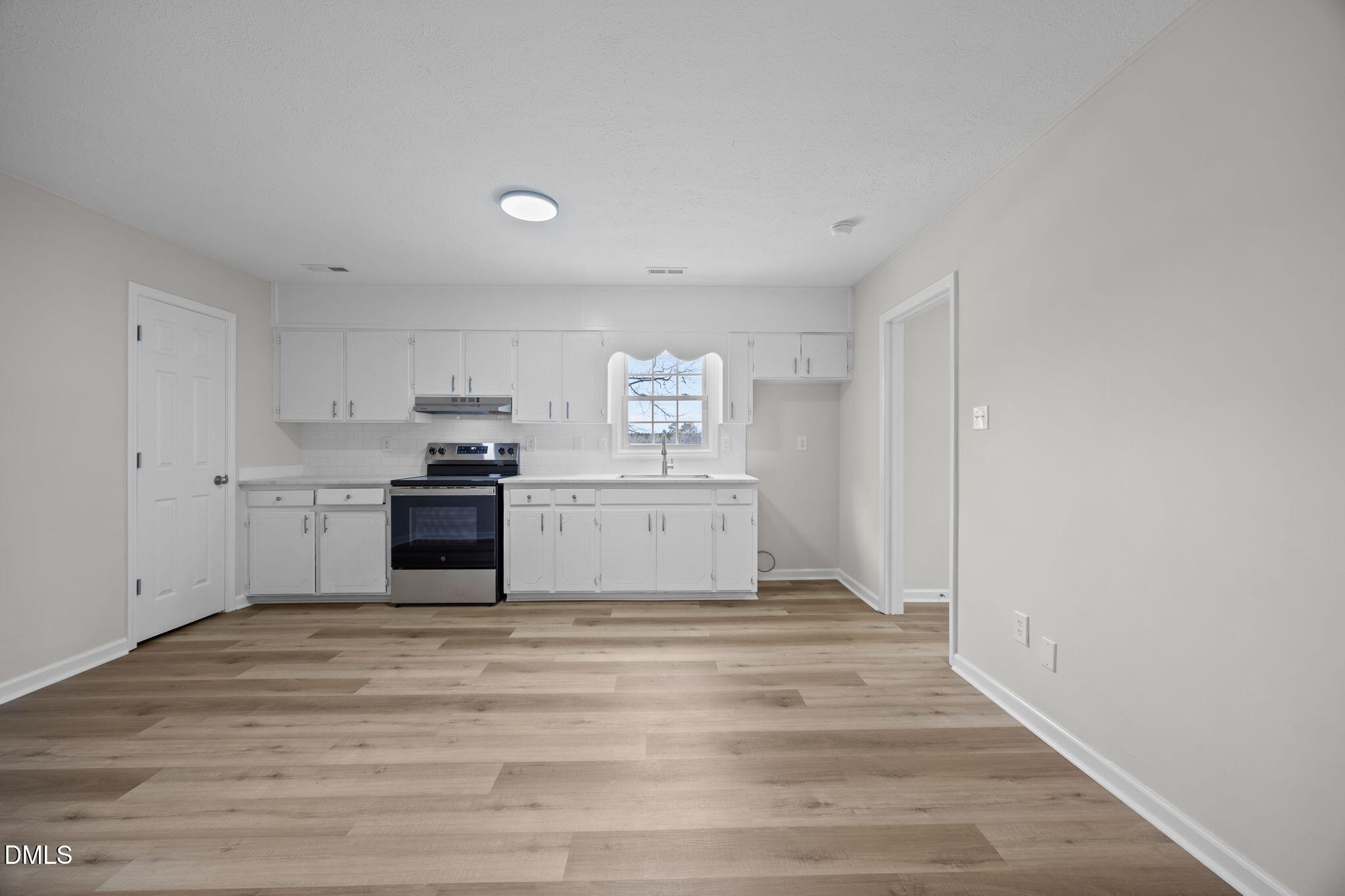 3285 Free Union Church Road Pinetown, NC 27865 - Photo 10 of 41 a view of a kitchen with wooden floor