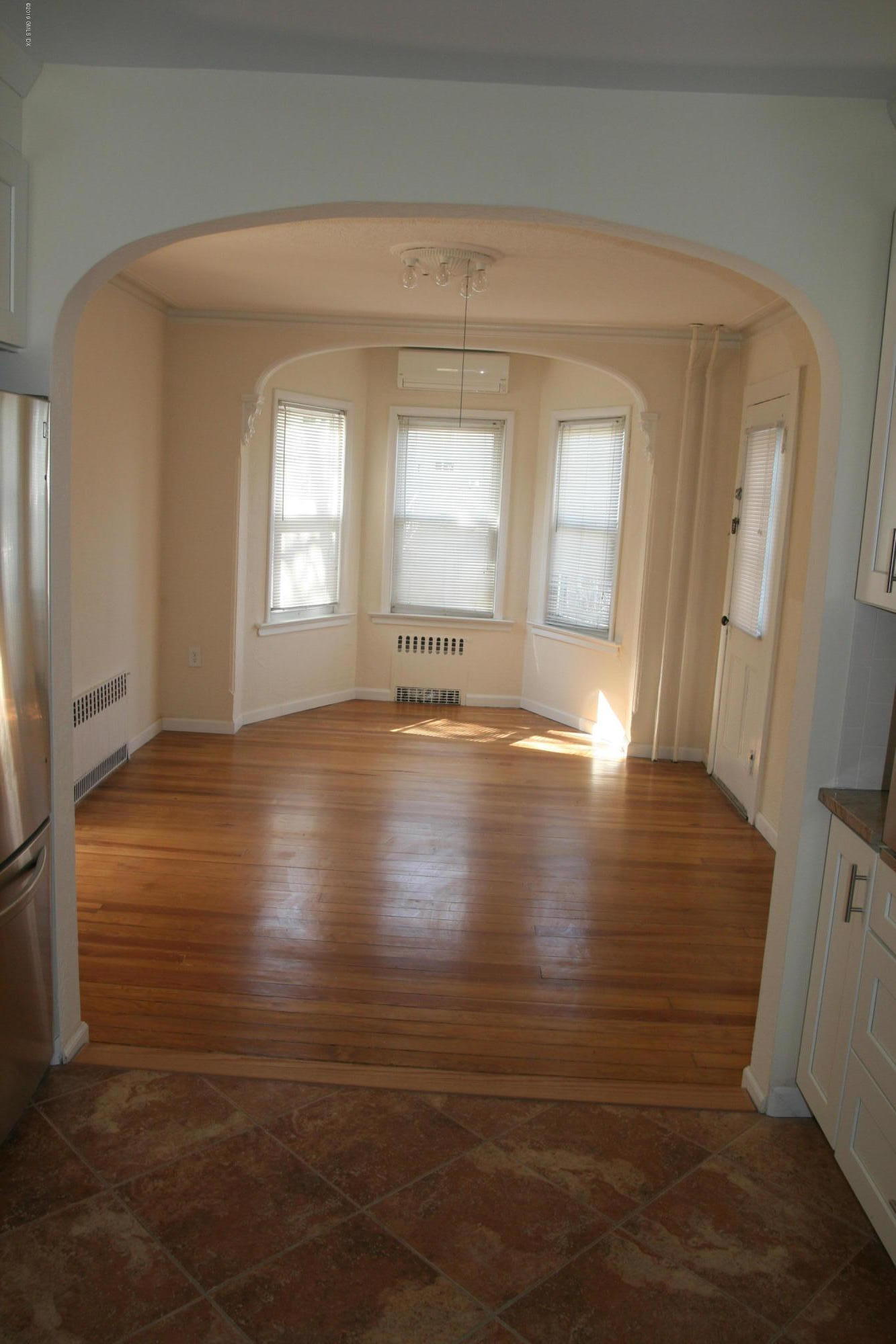 21 Byram Road Greenwich, CT 06830 - Photo 3 of 53 a view of room with window and wooden floor