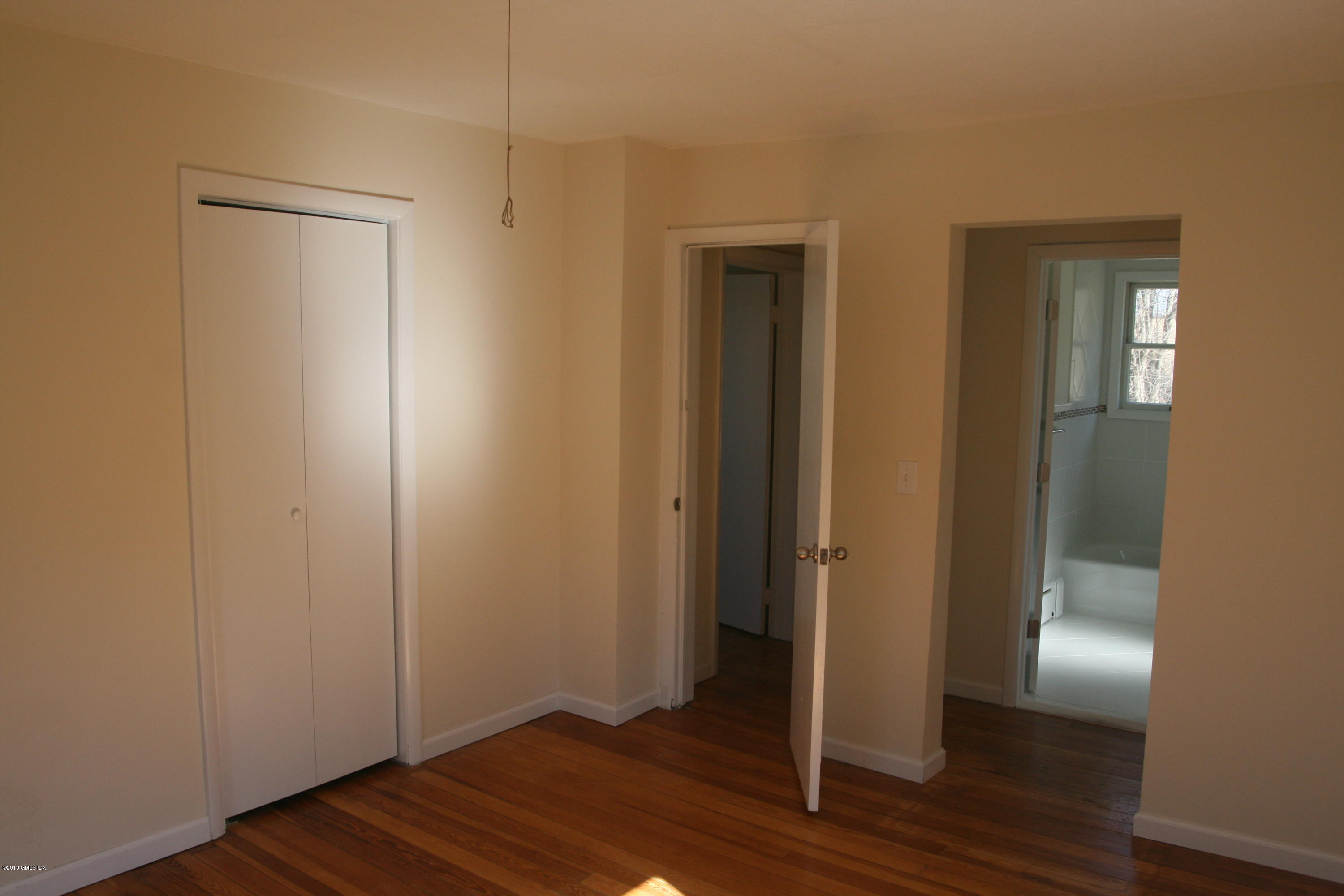 21 Byram Road Greenwich, CT 06830 - Photo 8 of 53 a view of empty room with wooden floor
