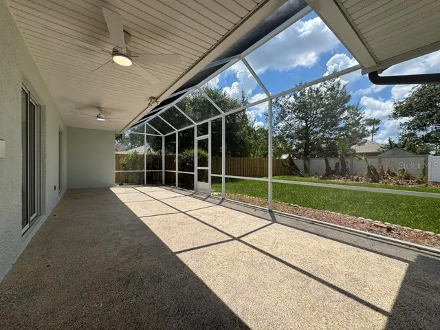 a view of an empty room with a garage