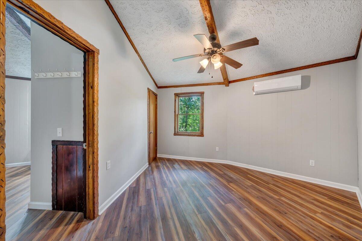 1902 Webbs Mill Road North Floyd, VA 24091 - Photo 16 of 30 a view of room with window and wooden floor