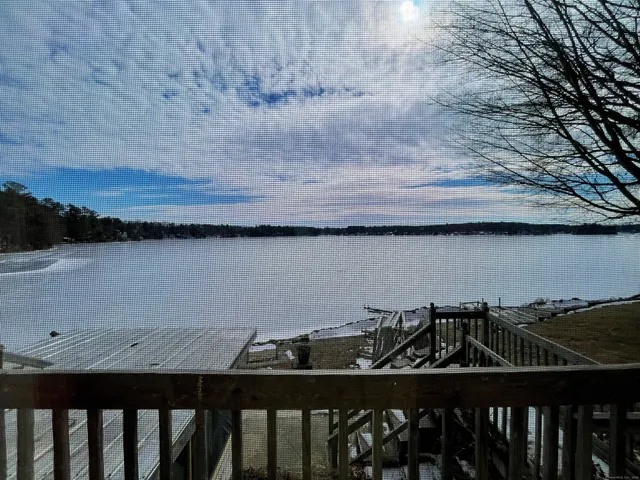 a bathroom with a shower and toilet